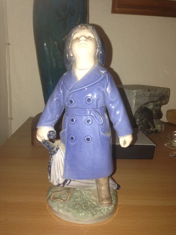 Royal Copenhagen Figurine Boy in Regncoat No 3556