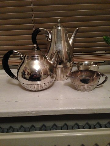 4 piece Georg Jensen Sterling Silver/830 silver Coffee and Tea Service in the 
Cosmos Pattern No 45. Very old marks.