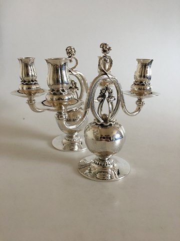 A Pair of Georg Jensen Sterling Silver Pomegranate Patterned Candelabras No 324