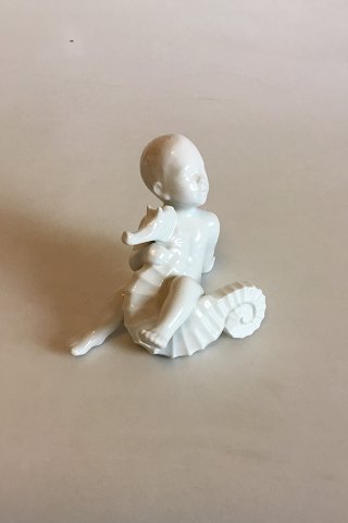 Bin g& Grondahl Blanc de Chine Figurine of Child with Seahorse No 2395