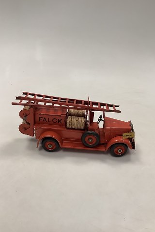 Tekno Falck fire ladder truck with flag.
