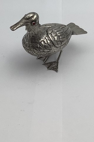 Snuff Bottle of a bird in silver with red stones as eyes