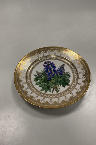 Royal Copenhagen Antique Plate with Flower Motif and gold. Signed by Christian  Klein from 1820-1850