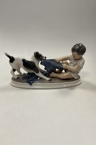 Dahl Jensen Figurine of Foxterrier dog in play with boy No. 1072