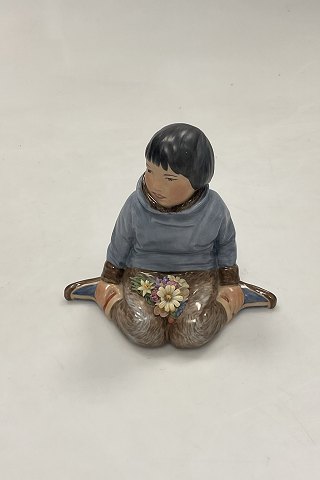 Royal Copenhagen Overglaze Figurine - Boy with Flowers from Greenland No. 12419