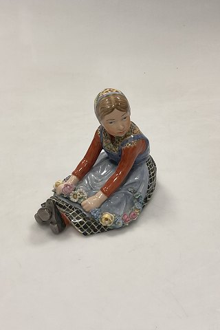 Royal Copenhagen Overglaze figurine of Flower Girl Jylland No. 12421