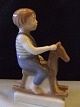 Royal Copenhagen Figurine Boy with Rocking Horse No 5196