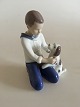 Bing & Grondahl Figurine of Boy Brushing His Dog No 2334.