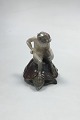 Royal Copenhagen Figurine of faun sitting on a turtle No 1880