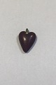 Old Amber pendent shaped as a heart
